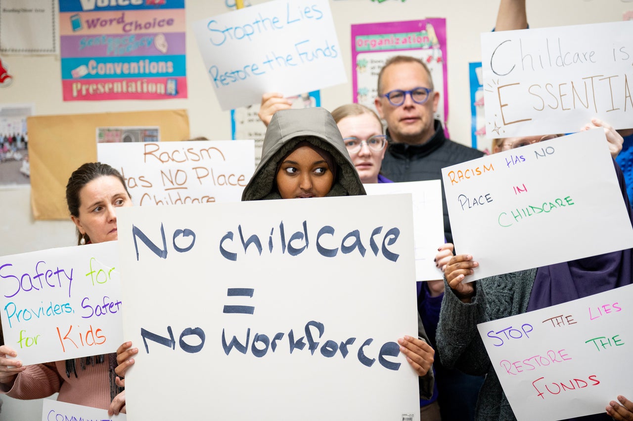 Parents, teachers, child care workers and community members protest the harassment child care providers experienced following a conservative influencer's video alleging widespread fraud.