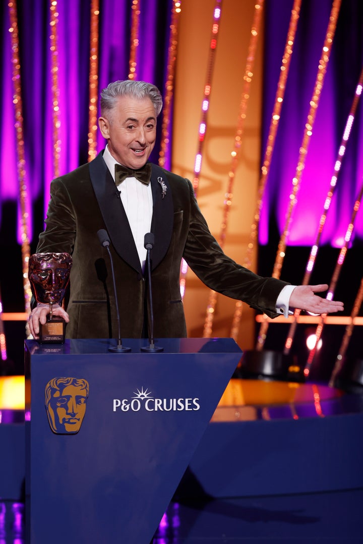 Alan Cumming on stage at last year's TV Baftas