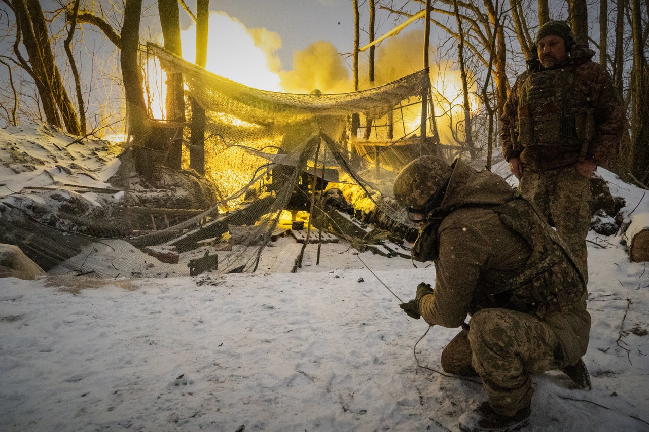 Ukrainian soldiers of the 48th separate artillery brigade fire at Russian positions on the frontline in Kharkiv region, Ukraine, Wednesday, Feb. 18, 2026. 