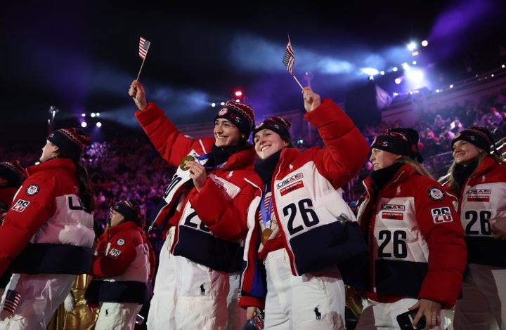 U.S. athletes smile as they participate in the closing ceremony of the 2026 Milan Cortina Games on Sunday in Verona, Italy.