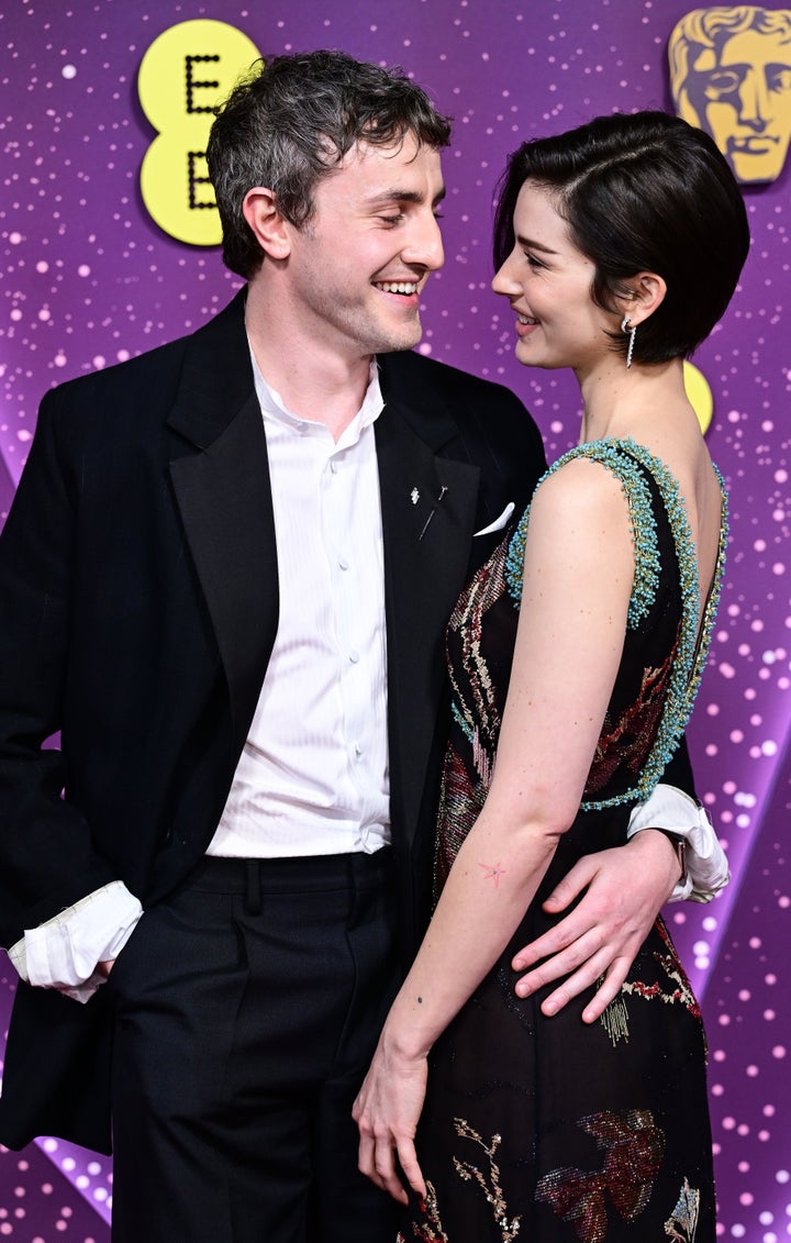 Paul Mescal and Gracie Abrams share a laugh on the Baftas red carpet