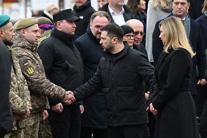 Zelenskyy says Putin does 1 Ukrainian President Volodymyr Zelenskyy and First Lady Olena Zelenska meet with troops at Independence Square after the ceremony to mark the fourth anniversary of the large-scale Russian invasion of Ukraine on February 24, 2026 in kyiv, Ukraine.