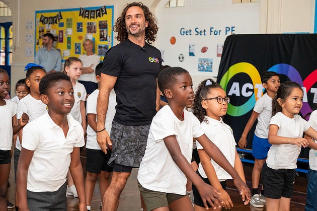 Joe Wicks visits a school as part of his mission to get more children moving. 
