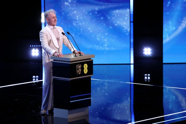 Alan Cumming on stage at the 2026 Baftas on Sunday night