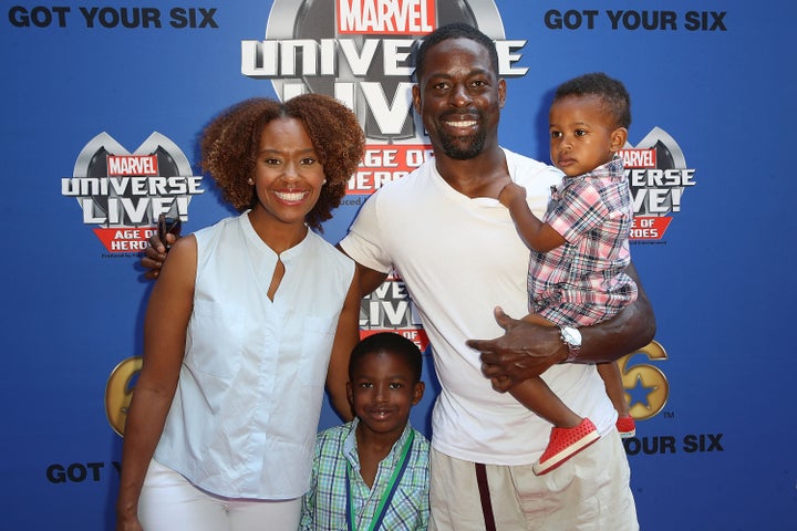 Sterling K. Brown, his wife and children arrive at a Marvel event in 2017.