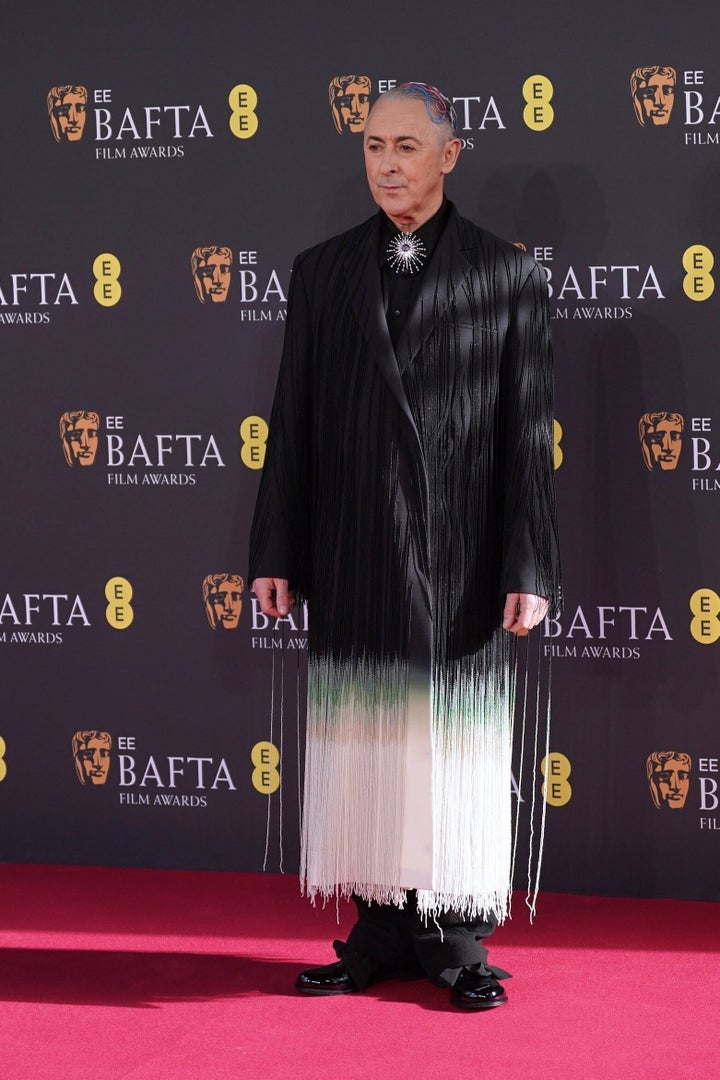Alan Cumming on the Baftas red carpet before Sunday's ceremony