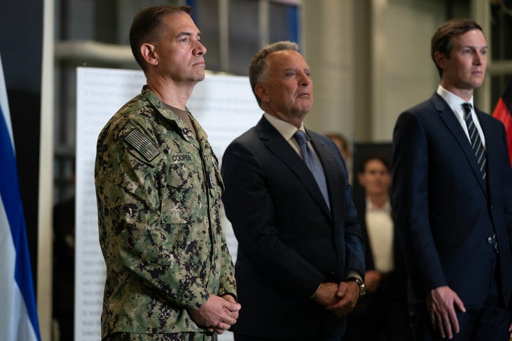 Steve Witkoff, U.S. Special Envoy to the Middle East, (C) Admiral Brad Cooper, commander of the United States Central Command (CENTCOM), (L) and Jared Kushner listen as U.S. Vice President JD Vance speaks during a press conference following a military briefing at the Civilian Military Coordination Center on October 21, 2025 in Kiryat Gat, Israel. (Photo by Nathan Howard - Pool/Getty Images)