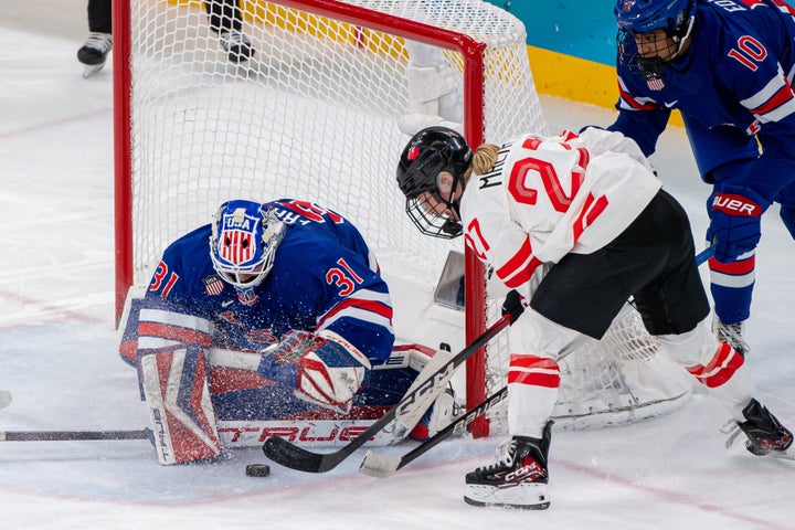 Canada's Emma Maltais tries to score against Team USA's Aerin Frankel during the women's hockey gold medal showdown in Milan last week.