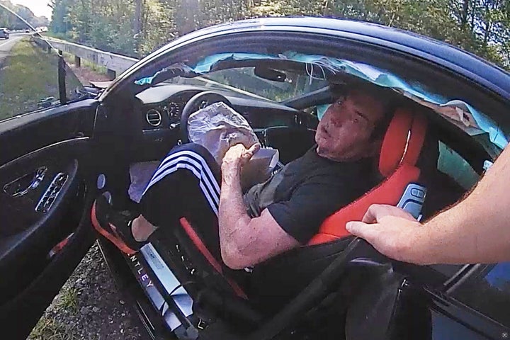 Newly released police video shows former WWE executive Vince McMahon crashing his luxury sports car into the back of another vehicle while being followed by a state trooper last summer in Connecticut.