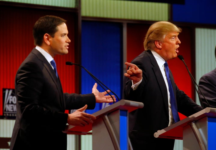 Marco Rubio and Donald Trump have a tense moment during the March 3, 2016, debate in Detroit. (AP Photo/Paul Sancya)