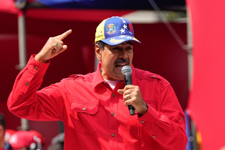 Venezuela's President Nicolas Maduro speaks to supporters during an event at the Miraflores Presidential palace in Caracas, Venezuela, on Feb. 4, 2024.