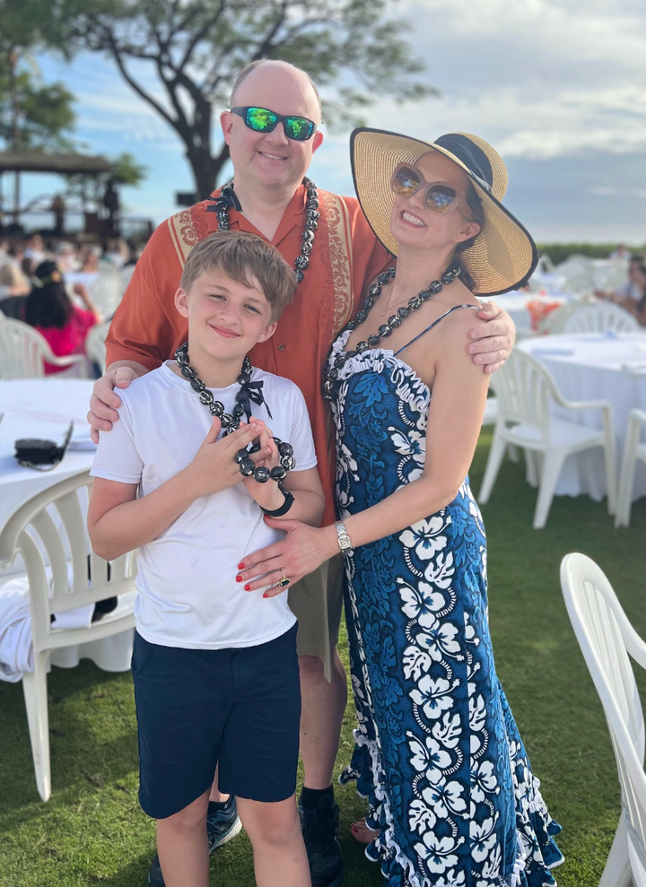 The author, right, with her husband, center, and son, left.