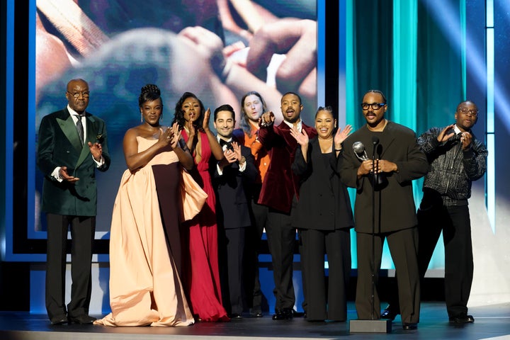 Delroy Lindo, Wunmi Mosaku, Jayme Lawson, Sev Ohanian, Ludwig Göransson, Michael B. Jordan, Zinzi Coogler, Ryan Coogler and Miles Caton accept the Best Picture Award for 