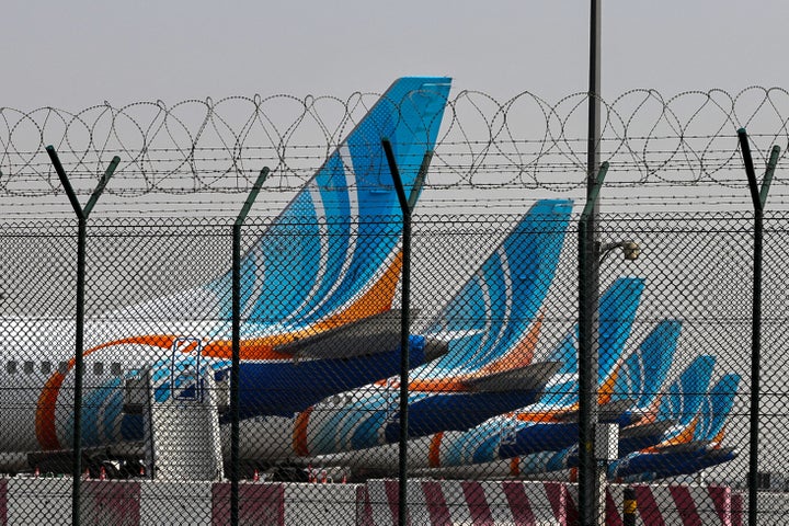 FlyDubai airline planes are parked on the tarmac at Dubai International Airport in Dubai on March 2, 2026. Israel bombed Lebanon on March 2 following Hezbollah rocket fire, several U.S. warplanes crashed in Kuwait and Iran struck the region with missiles, as the war with Israel and the United States expanded.