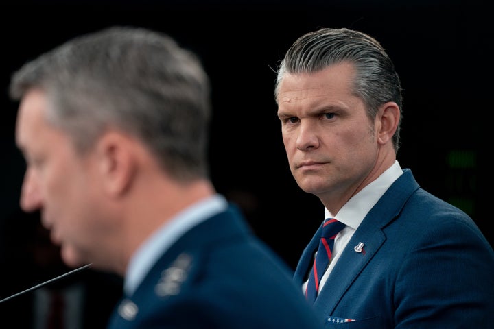 Defense Secretary Pete Hegseth right, and Dan Caine, chairman of the Joint Chiefs of Staff, during a news conference at the Pentagon in Arlington, Virginia, on March 2, 2026. Hegseth rejected the idea that the war against Iran would be the sort of endless conflict that President Donald Trump swore to avoid when he took office a second time, saying "our generation knows better."