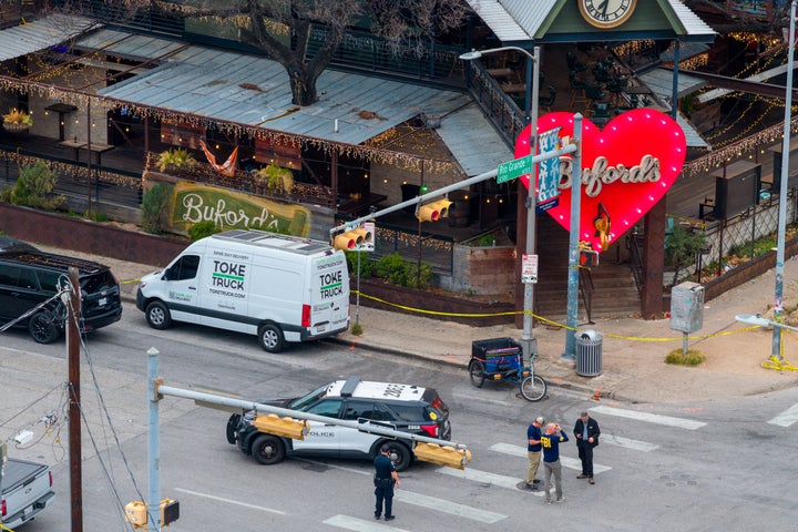 FBI and local law enforcement officers patrol after a mass shooting at Buford's bar in Austin, Texas.