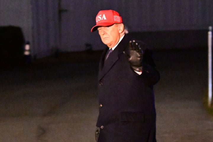 Trump walks on the South Lawn of the White House after arriving on Marine One as joint U.S. and Israeli military strikes on Iran continue on March 1, 2026.