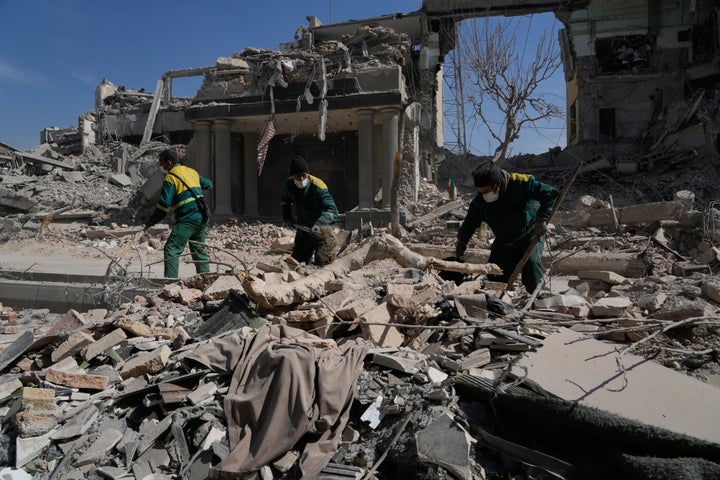 Workers remove the rubble of a police facility struck during the U.S.–Israeli military campaign in Tehran, Iran, on March 4, 2026.