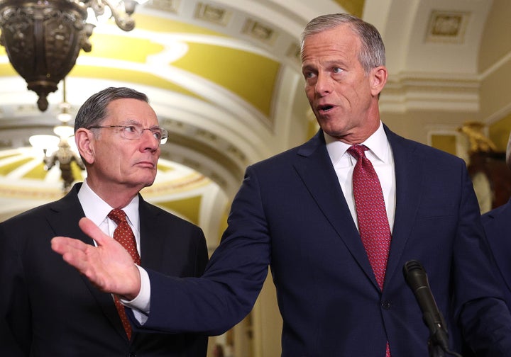 U.S. Senate Majority Leader John Thune (R-S.D.), joined by Sen. John Barrasso (R-Wy.), speaks to reporters following the weekly Senate Republican policy luncheon at the U.S. Capitol on March 3.