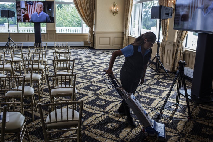 A worker vacuums a carpet at President Donald Trump's Trump National Golf Club Westchester back in 2016. In addition to vermin, the club house reportedly had dirty surfaces, “poorly constructed” rooms, inadequate lighting and improper ventilation.