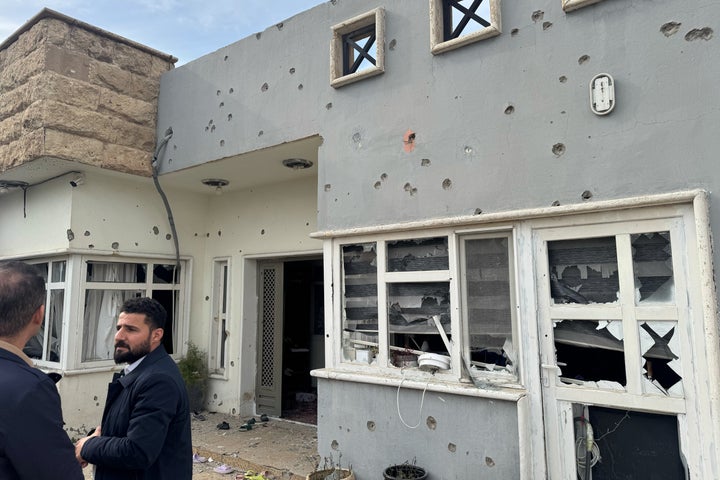Iraqi Kurds inspect the damage to their homes, after a drone attack struck their neighbourhood in Irbil, Iraq, Wednesday, March 4, 2026. (AP Photo/Salar Salim)