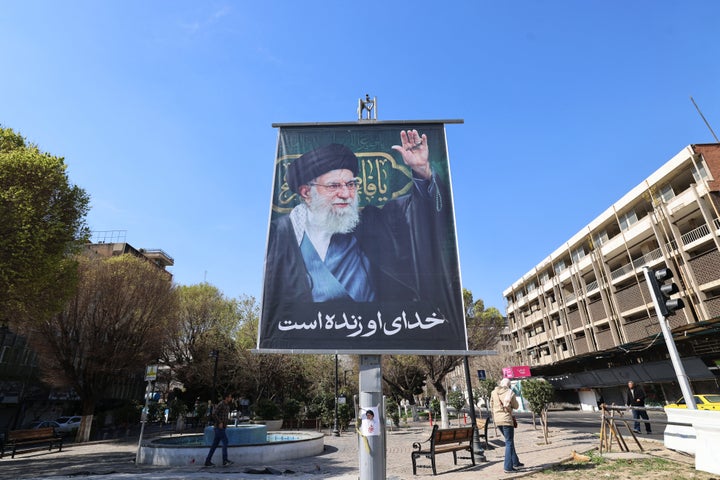 A poster with a picture of Iran's slain supreme leader Ayatollah Ali Khamenei is seen installed along a street at the Valiasr Square in Tehran on March 5, 2026. Iran announced that a state funeral for supreme leader Ayatollah Ali Khamenei, which had been planned for March 4 evening in Tehran, was postponed "in anticipation of unprecedented turnout," state television reported.