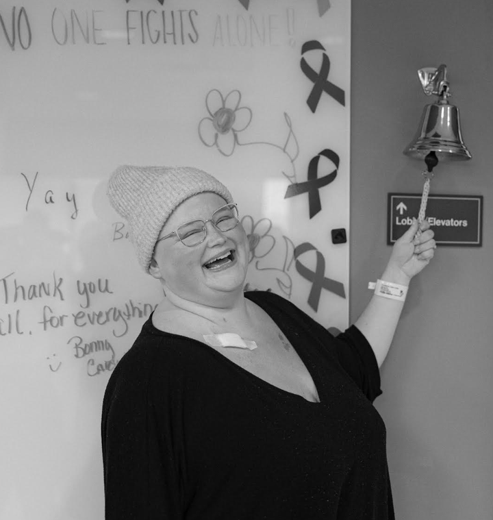 The author ringing the bell after finishing 6 rounds of chemotherapy