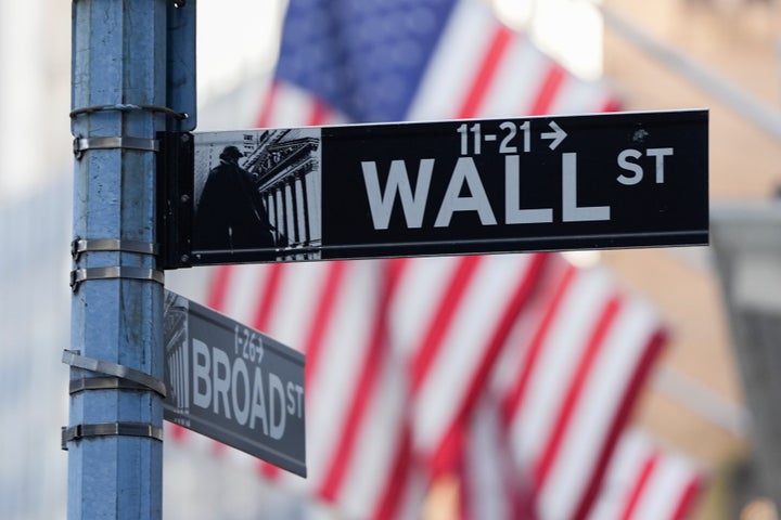 A sign outside the New York Stock Exchange marks the intersection of Wall and Broad Streets, Monday, Jan. 27, 2025, in New York. (AP Photo/Julia Demaree Nikhinson)