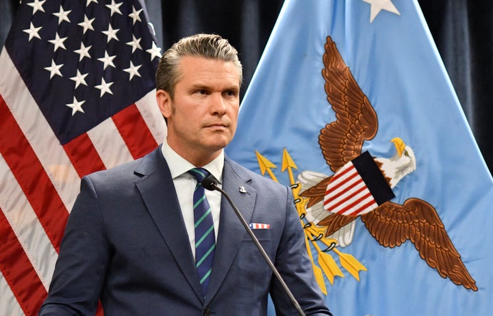 US Secretary of Defense Pete Hegseth looks on during a joint press conference with Admiral Charles Bradford "Brad" Cooper II, Commander of US Central Command, at US Central Command (CENTCOM) headquarters at MacDill Air Force Base in Tampa, Florida, on March 5, 2026. (Photo by Octavio JONES / AFP via Getty Images)