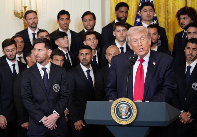 Lionel Messi, a soccer player for Inter Miami CF, left, as US President Donald Trump speaks during an event with Inter Miami CF in the East Room of the White House in Washington, DC, US, on Thursday, March 5, 2026. Inter Miami CF is visiting the White House to celebrate their 2025 championship win.