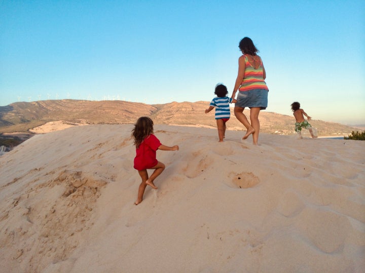 The author and her family on a beach walk in Andalucia, Spain