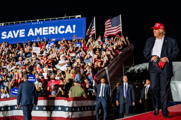 Trump doesn't just wear his hats at his rallies — but also tosses them out to the crowd, on occasion. 