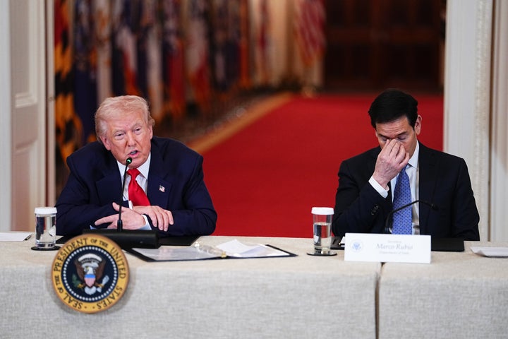 US President Donald Trump, left, and Marco Rubio, US secretary of state, during a Saving College Sports roundtable in the East Room of the White House in Washington, DC, US, on Friday, March 6, 2026. A new council that will explore ways to overhaul college sports is expected to discuss a potential antitrust exemption, a policy change the National Collegiate Athletic Association has sought to protect itself from legal challenges to player compensation rules. Photographer: Aaron Schwartz/Bloomberg via Getty Images