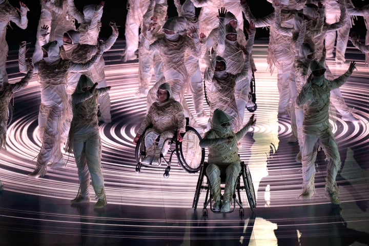 Dancers perform during the opening ceremony at the 2026 Winter Paralympics, in Verona, Italy, Friday, March 6, 2026. (AP Photo/Luca Bruno)