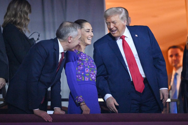 President Donald Trump speaks with Canadian Prime Minister Mark Carney and Mexican President Claudia Sheinbaum after the 2026 World Cup draw in Washington, DC, last year.