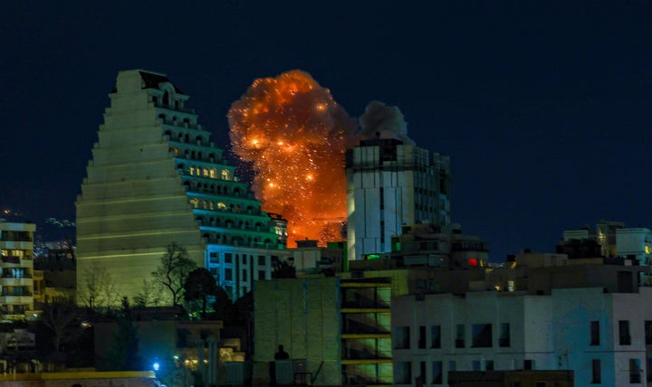 TEHRAN, IRAN - MARCH 07: A large plume of smoke rises over Tehran after explosions were reported in the city during the night on March 07, 2026 in Tehran, Iran. (Photo by Contributor/Getty Images)