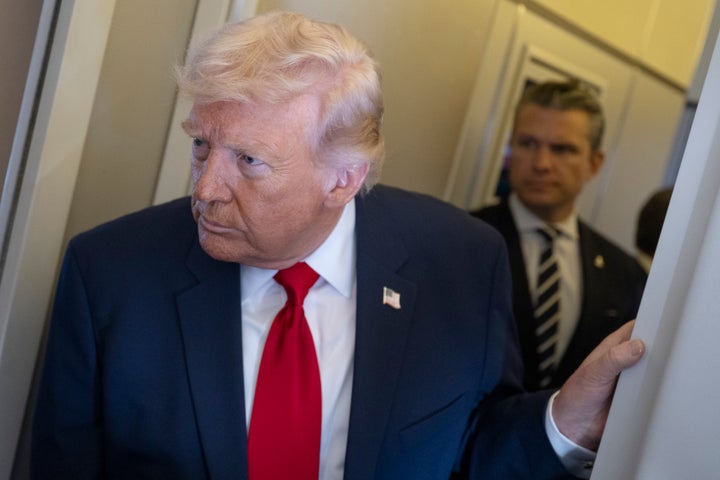 IN FLIGHT- MARCH 7:U.S. President Donald Trump speaks to members of the media traveling on Air Force One while heading to Miami on March 7, 2026. President Trump and other members of the government attended the dignified transfer of six soldiers from the 103rd Sustainment Command who were killed in action by an Iranian drone strike on March 1 in Port of Shuaiba, Kuwait during "Operation Epic Fury". (Photo by Roberto Schmidt/Getty Images)