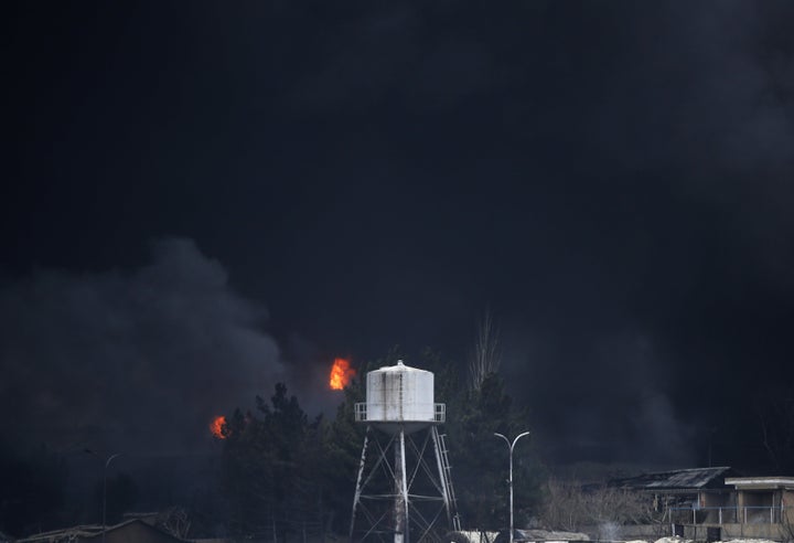 TEHRAN, IRAN - MARCH 8: Black smoke rises after fires broke out following US-Israel attacks targeting some oil storage facilities targeted, including the Shehran oil depot, in Tehran, Iran on March 8, 2026. Explosions and ignited leaking petroleum from the depot caused severe damage to nearby vehicles as intense flames engulfed the area following the strike. Firefighting teams try to control the spreading fires and contain the damage in the heavily affected industrial zone. (Photo by Fatemeh Bahrami/Anadolu via Getty Images)