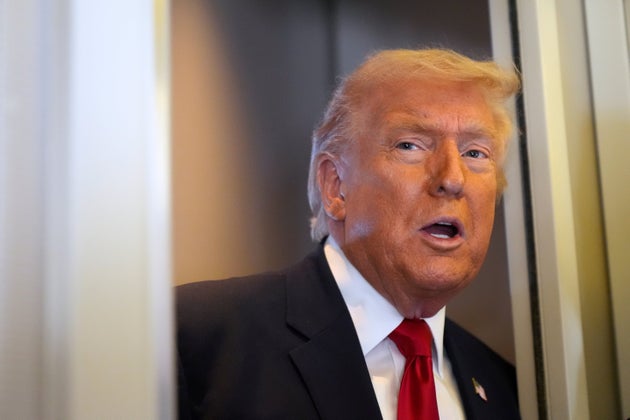 President Donald Trump speaks to reporters while traveling aboard Air Force One en route from Dover Air Force Base, Del., to Miami, Saturday, March 7, 2026. 