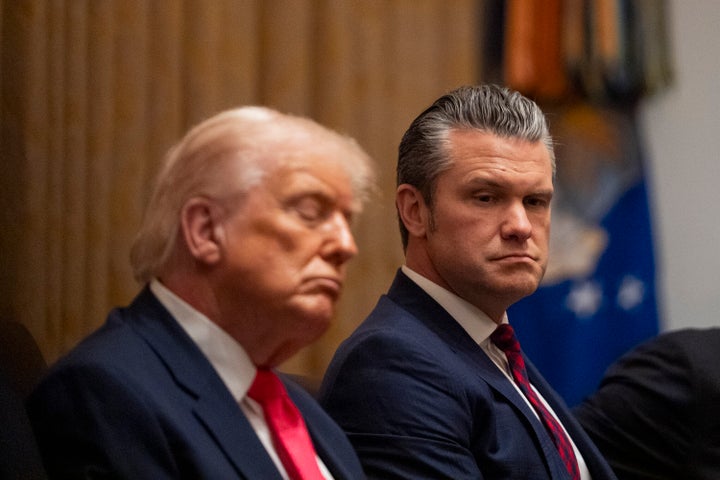 President Donald Trump appears to fall asleep next to Defense Secretary Pete Hegseth during a Cabinet meeting in December 2025.