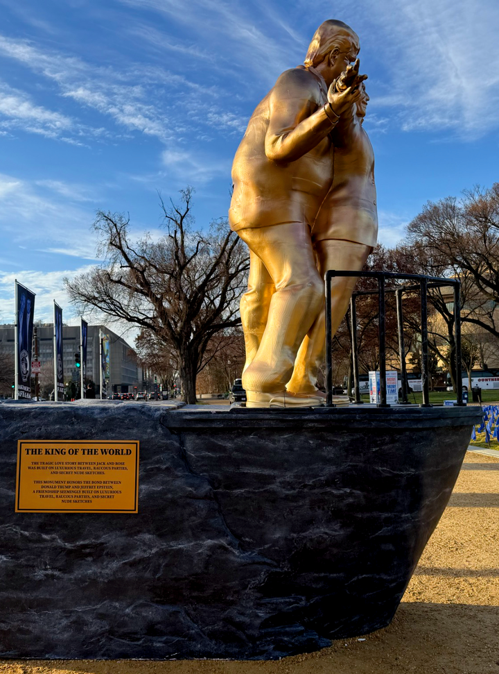 The Trump-Epstein statue was erected by a group known as The Secret Handshake.