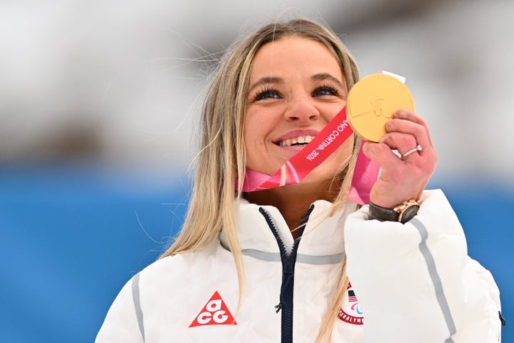 Oksana Masters celebrates her gold medal at the Milan Cortina Paralympics on Tuesday.