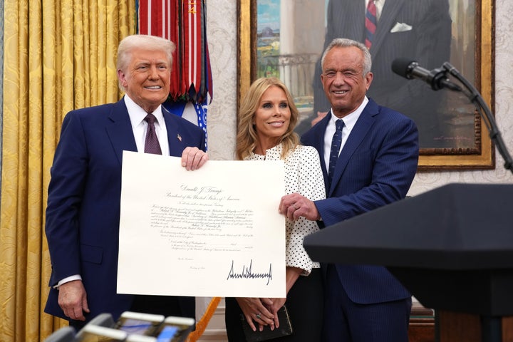President Donald Trump, Robert F. Kennedy Jr. and Hines pose after Kennedy was sworn in as secretary of health and human services last year in the Oval Office of the White House.