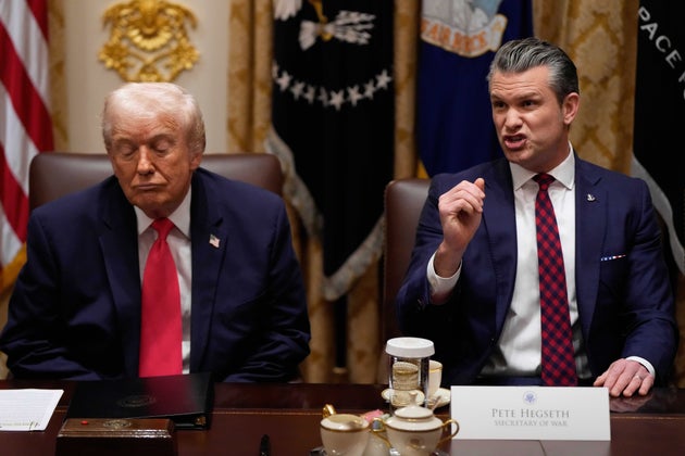 Hegseth and President Donald Trump during a Cabinet meeting at the White House on Dec. 2, 2025.