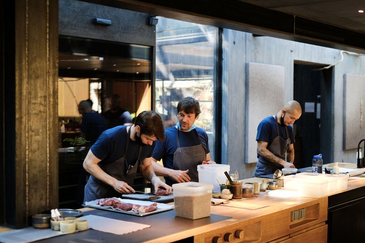 Redzepi, pictured here in the kitchen at Noma in Copenhagen in 2021, has long been dogged by reports of mistreatment of his staff, as well as years of using unpaid interns to work at the expensive restaurant.