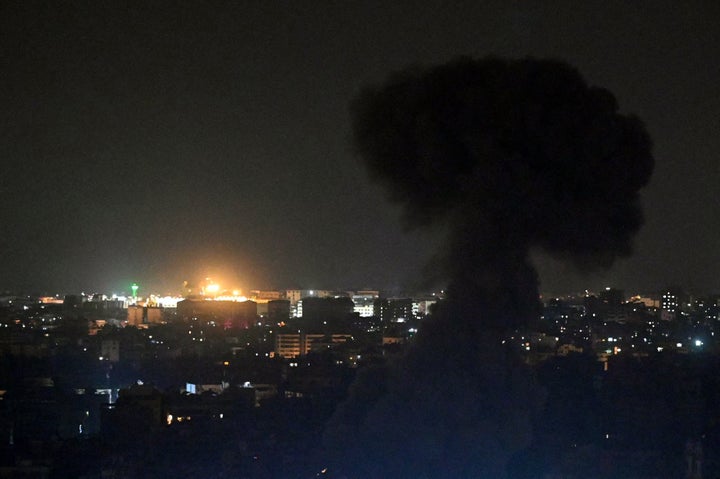 Smoke rises from the site of an Israeli air strike targeting an area in the southern suburbs of Beirut, Lebanon, on March 13, 2026. Israel continued to strike Beirut, threatening to expand its operations and seize territory in Lebanon if the militant group Hezbollah did not stop its attacks. (Photo by FADEL itani / AFP via Getty Images) /