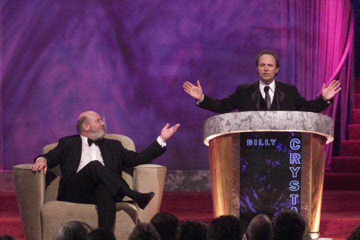 Rob Reiner and Billy Crystal on stage during the New York Friars Club Roast of Reiner in 2000.