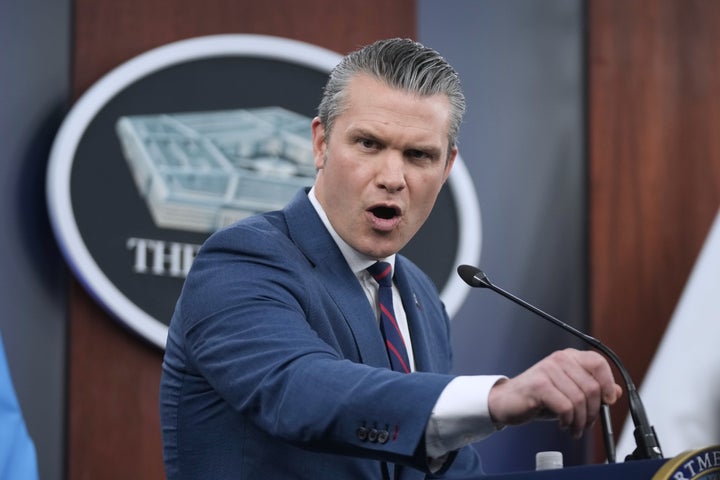 Hegseth, seen here gesticulating with his pen during a news briefing earlier this month.