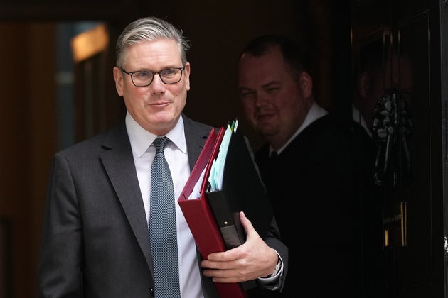 Britain's Prime Minister Keir Starmer leaves 10 Downing Street to attend the weekly Prime Ministers' Questions session in parliament in London, Wednesday, March 11, 2026. 