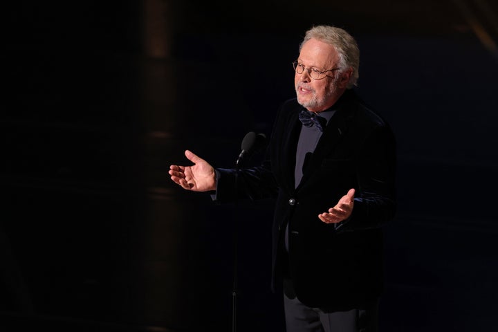 Billy Crystal speaks onstage Sunday during a special tribute to the late filmmaker Rob Reiner at the 98th Academy Awards.